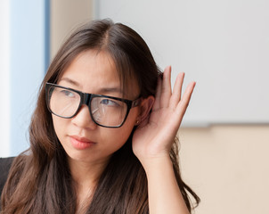 Chinese businesswoman listening