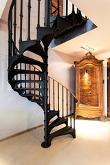 Spiral staircase and a wardrobe