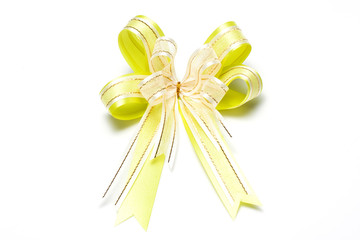beautiful yellow bow is isolated on a white background