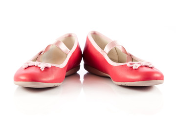 Naklejka premium red shoes on white background.