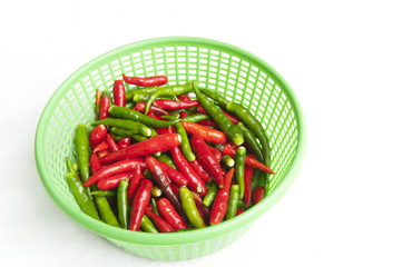 Red and green hot pepper in the basket