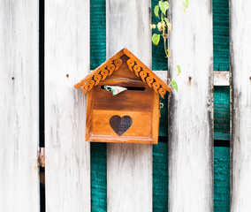 A wooden post box