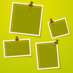 Set of photo frames on green background.