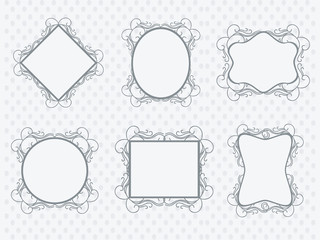 Set of floral decorated photo frames in different shapes.