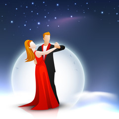 Young couple dancing on blue background, love concept.