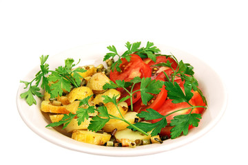 roasted potatoes with tomatoes.
