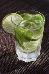 Mojitos with mint leaves, lime and ice