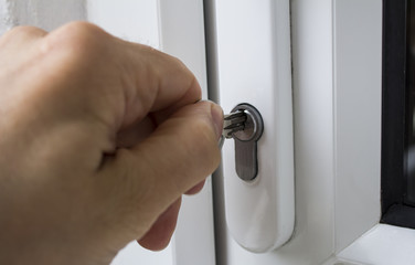 Naklejka premium Key going into a lock