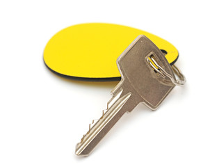 key with a tag on a white background