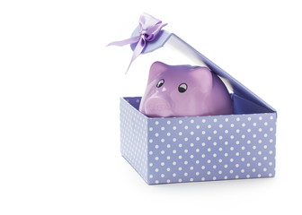 Piggy bank in a gift box on white