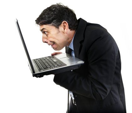 Guilty man peering at x-rated content on his pc
