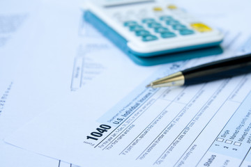 Naklejka na ściany i meble U.S.Tax form, pen and calculator