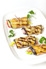 Eggplant rolls stuffed with ham and cheese