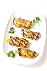 Eggplant rolls stuffed with ham and cheese
