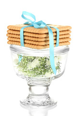 Sweet cookies tied with colorful ribbons isolated on white