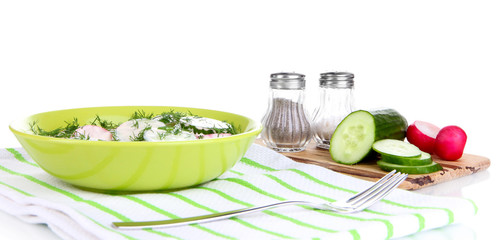 Vitamin vegetable salad in plate isolated on white