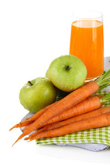 Glass of juice, apples and carrots, isolated on white