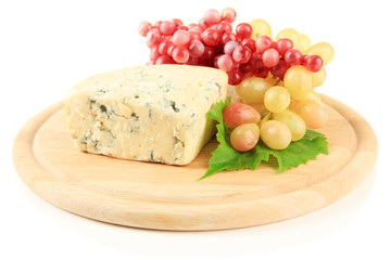 Tasty blue cheese and grape on cutting board, isolated on white