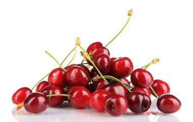 Many ripe red cherry berries isolated on white