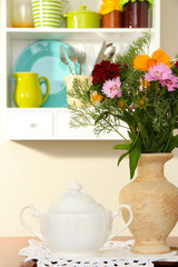 Kitchen composition on table on shelf background