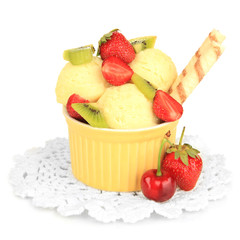 Delicious  ice cream with fruits and berries in bowl isolated