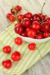 Cherry berries on wooden table close up