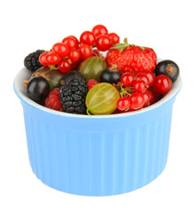 Ripe berries in bowl isolated on white