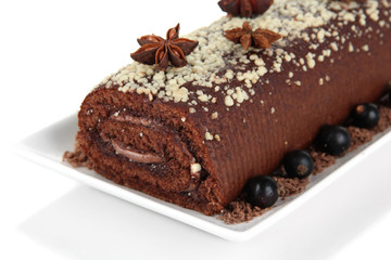 Sweet roll on plate isolated on white