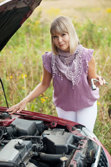 Fototapeta na wymiar woman repairing her car