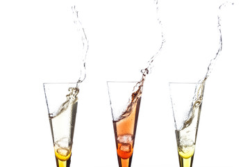 touch glasses with champagne splashing