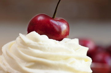 cup cake topping with cherry