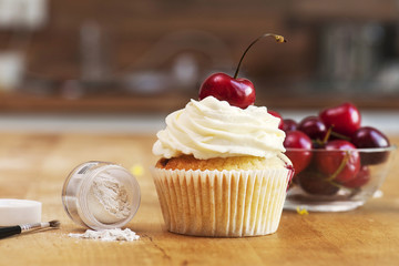 Cupcake with Cherries and icing glitter