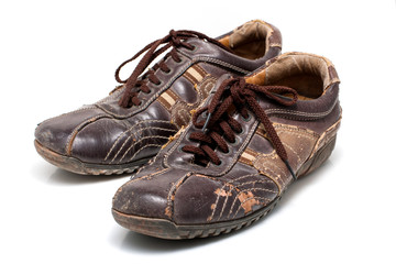 Old Leather shoes brown color on white background