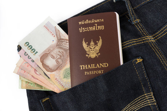 Thailand Passport and money in jeans