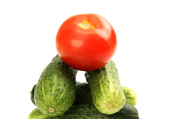 green cucumber and red tomato.