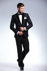 full body of a business man looking away