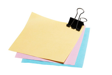 post-it note paper with binder clip on white background