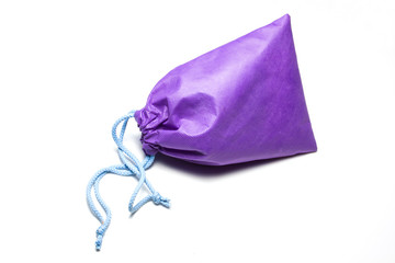 violet cotton bag on white background