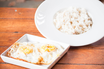 Homemade meal with rice and double star eggs