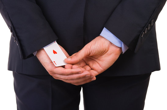 Businessman With Ace Card Hidden Under Sleeve.