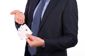 Businessman showing playing cards.