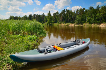 Kayak on the river's shore