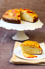 Sponge cake with peach mousse on top