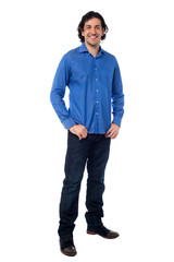 Fototapeta premium Full length shot of a smiling young man