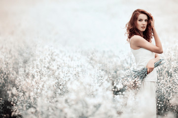 Fototapeta premium young beautiful girl in the field