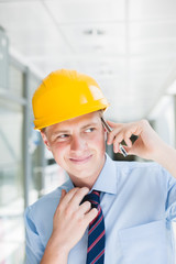 engineer in hard hat talking on the phone