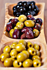 Variety of green, black and mixed marinated olives