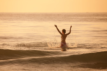 Woman takes rest at the sea shore