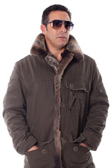 Obraz premium Somber tough guy and black sunglasses, looking at camera.