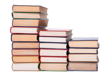 Multicolored books stack isolated on white background.